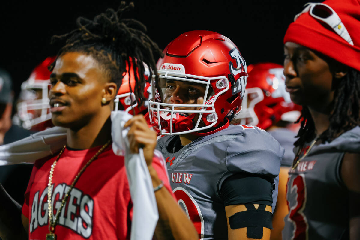 Arbor View’s Quintin Longmire (29) watches from the sidelines during a football game on ...