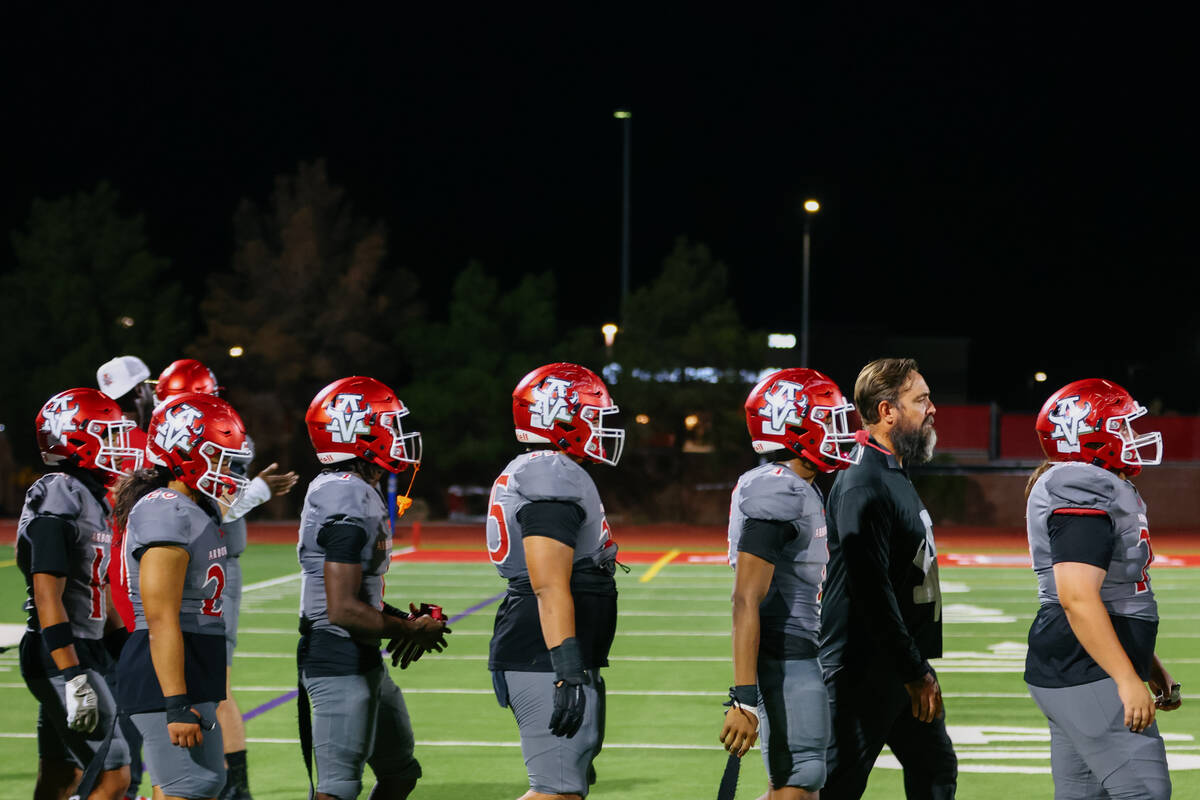 Arbor View players line up to shake hands with Millard South after a football game on Friday, A ...