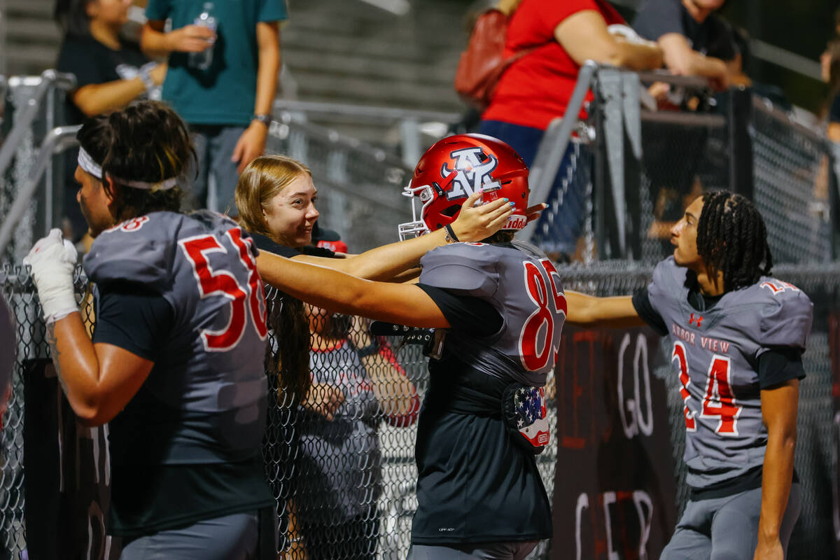 Loved ones greet Arbor View players after a football game on Friday, Aug. 29, 2025 at Arbor Vie ...