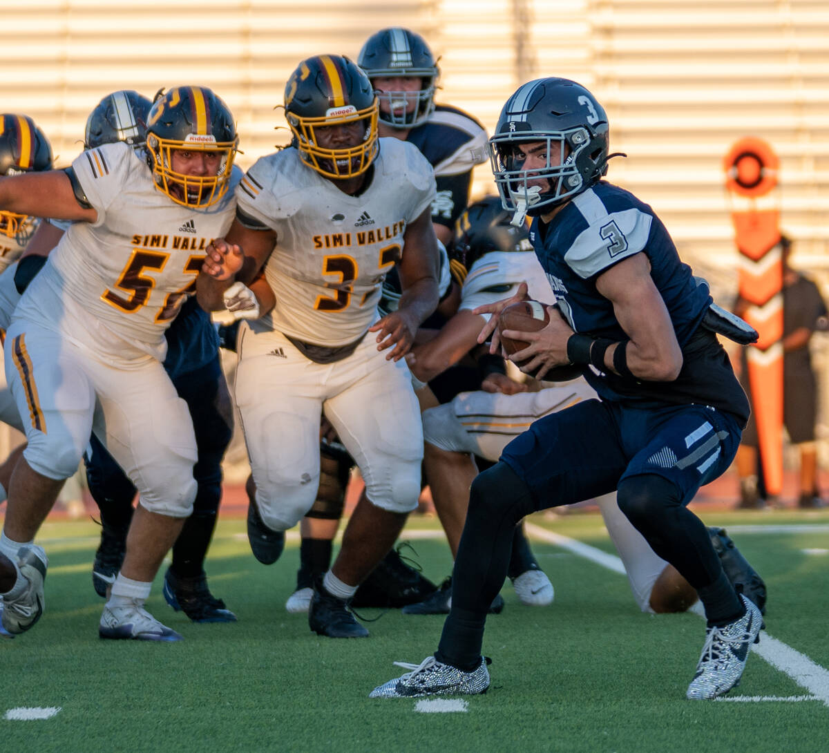 Shadow Ridge Player Ula Cox (3) looks for an open pass during a football game between Shadow Ri ...