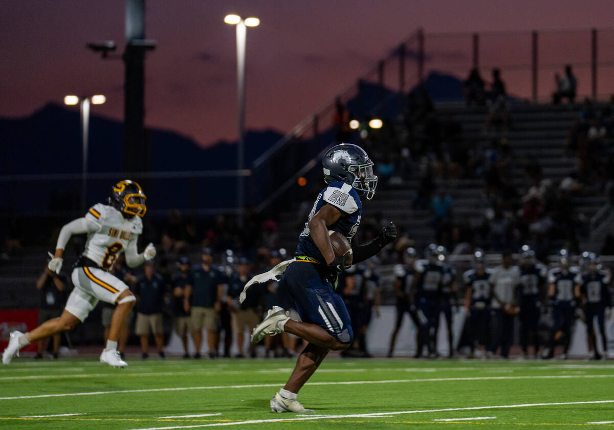 Shadow Ridge’s Trevin Young (29) breaks away during a football game between Shadow Ridge ...