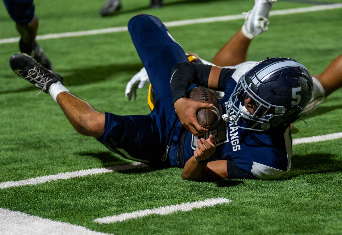 Shadow Ridge Player Isaiah Ruiz (5) hits the ground during a football game between Shadow Ridge ...