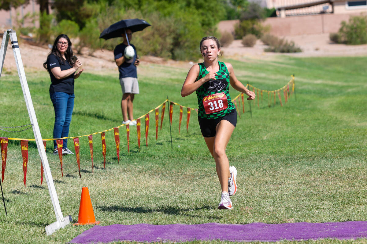 Palo Verde High School Ava Levy is first to reach the finish line during the Junior/Senior Girl ...