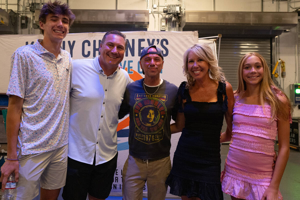 From left, the Mullen family -- son Canon, Dan, wife Megan and daughter Bree -- with country su ...