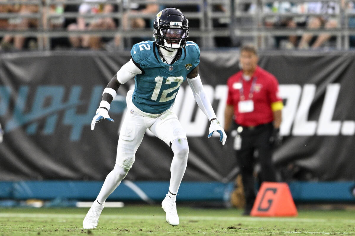 Jacksonville Jaguars defensive back Travis Hunter (12) follows a play during the first half of ...