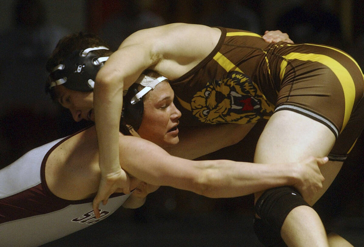 Randel Aleman, left, of Cimarron Memorial High School becomes a four-time state champion when h ...