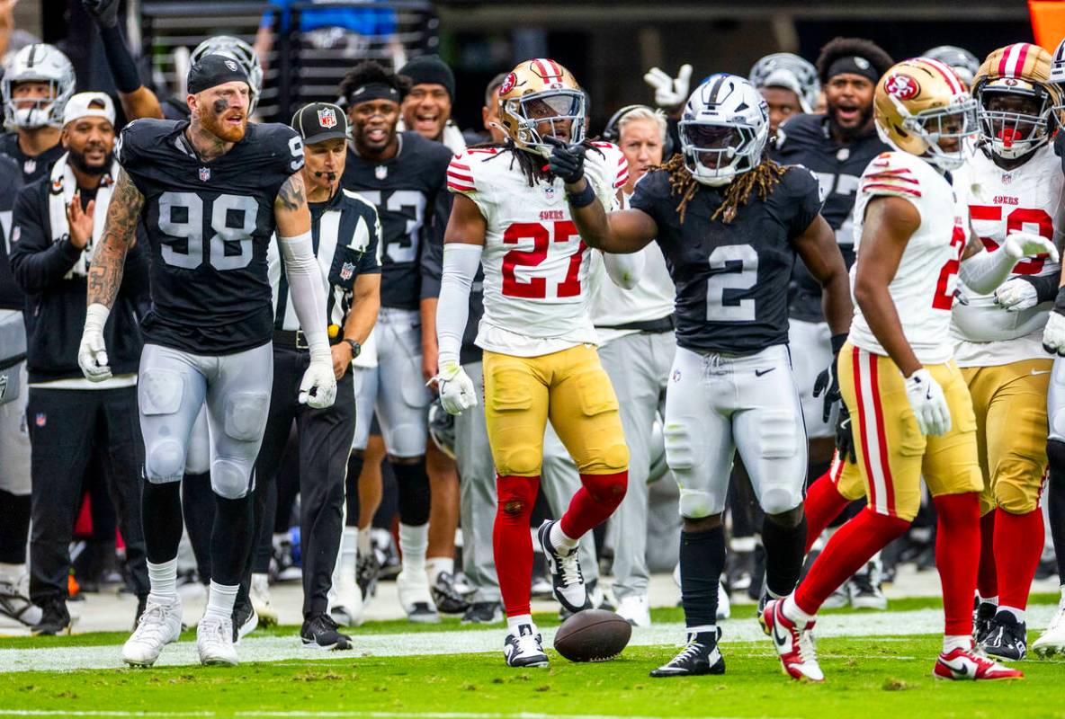 Raiders running back Ashton Jeanty (2) points to another first down against San Francisco 49ers ...