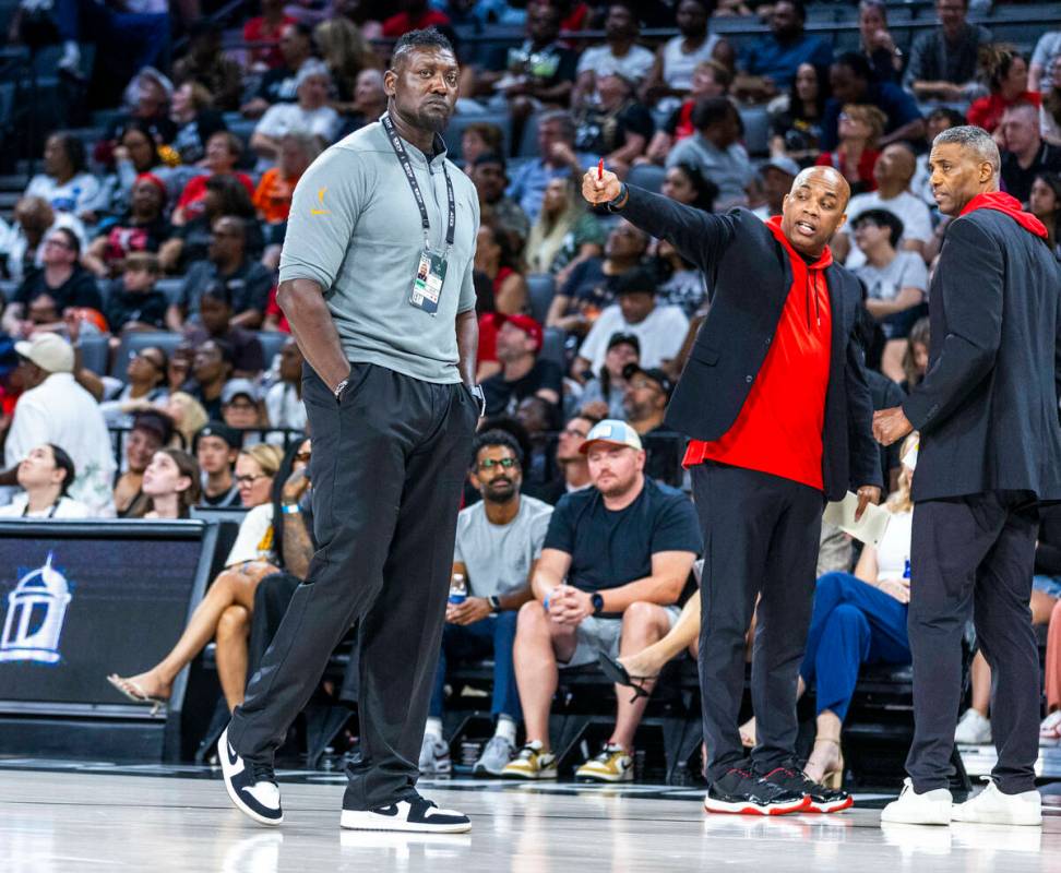 Las Vegas Aces security director Sonny Watson keeps a watch on the crowd on a time out during t ...