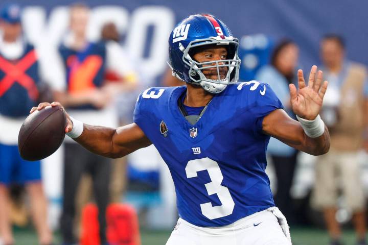 New York Giants quarterback Russell Wilson (3) passes the ball against the New York Jets during ...