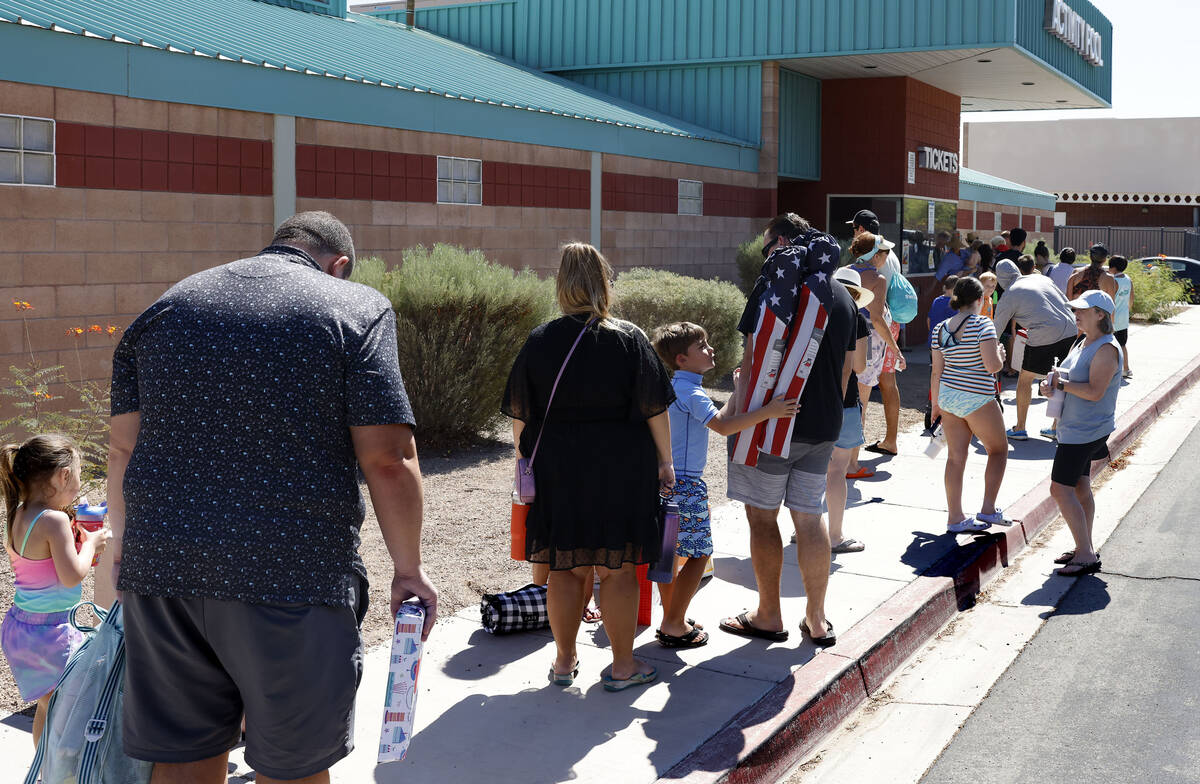 People line up to enter Whitney Ranch Pool to attend Labor Day pool party at in Henderson on Mo ...