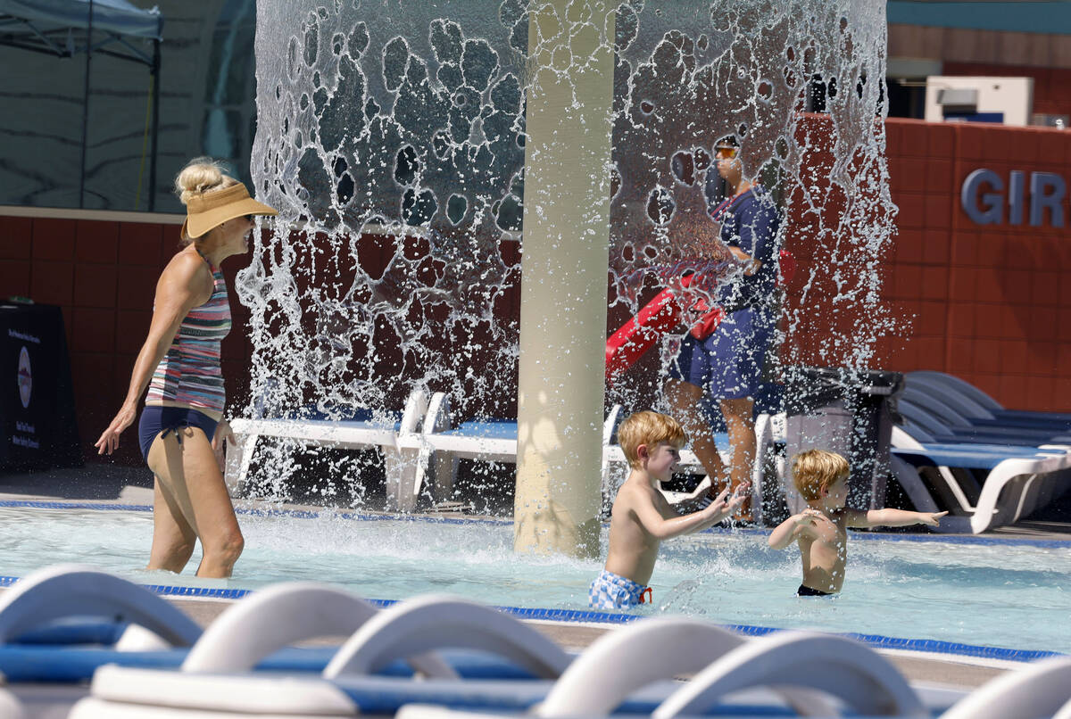 Jody Tarchione, left, plays with her grandsons Maddox Philip, 5, center, and Landon, 3, at Whit ...