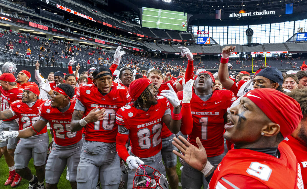 UNLV players dance and sing the school fight song defeating the Idaho State Bengals during thei ...