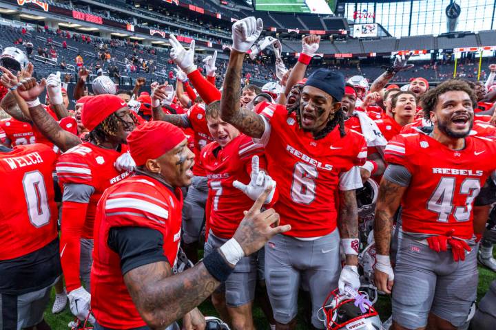 UNLV players dance and sing the school fight song defeating the Idaho State Bengals during thei ...