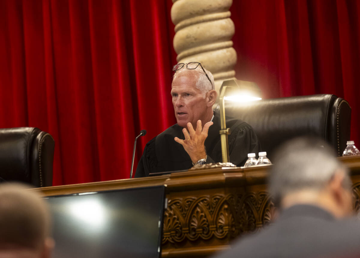 Nevada Supreme Court Chief Justice Douglas Herndon speaks during oral arguments in a case regar ...