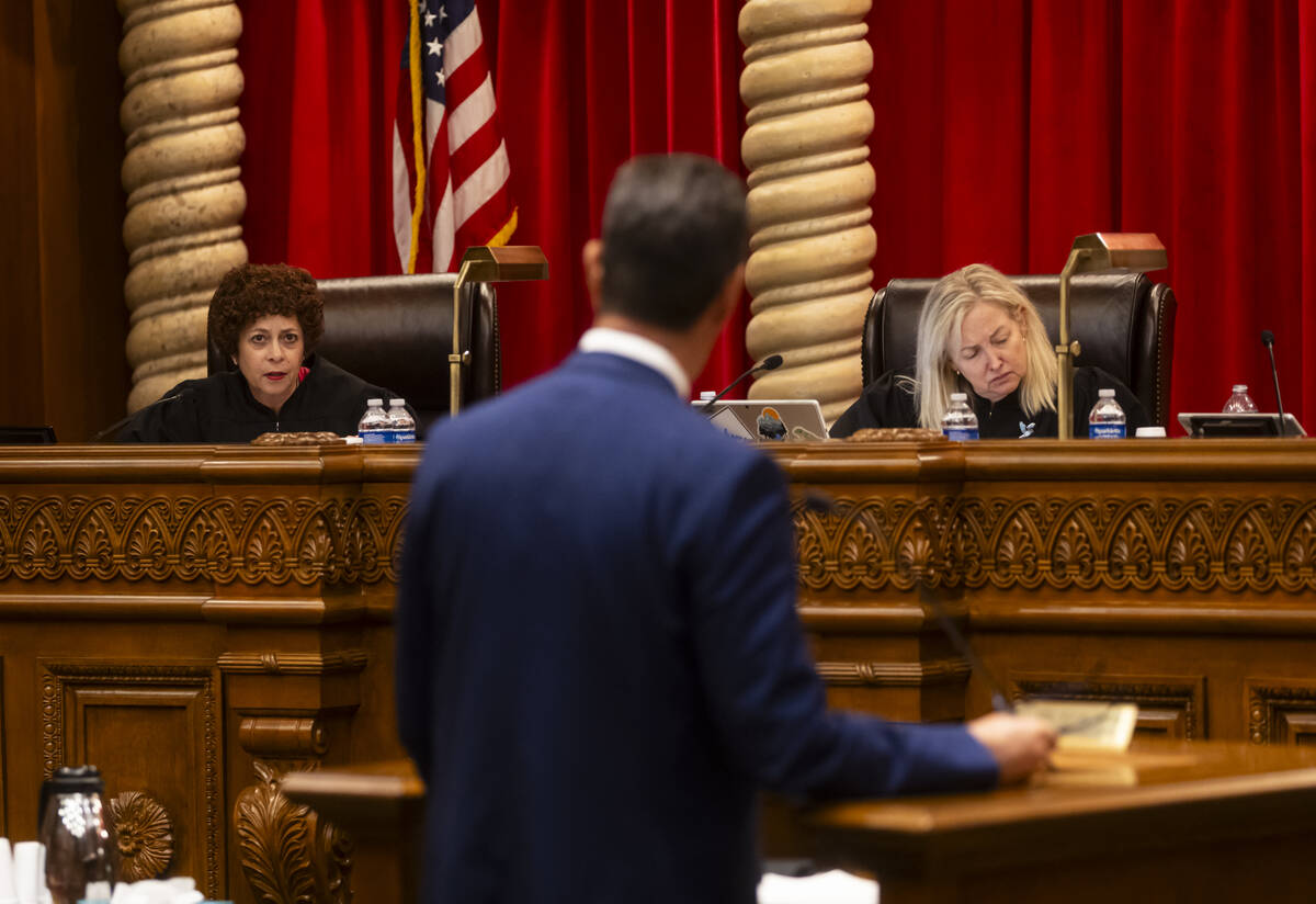 Nevada Supreme Court Justice Elissa Cadish, left, asks a question of Attorney Paul Taggart, rep ...