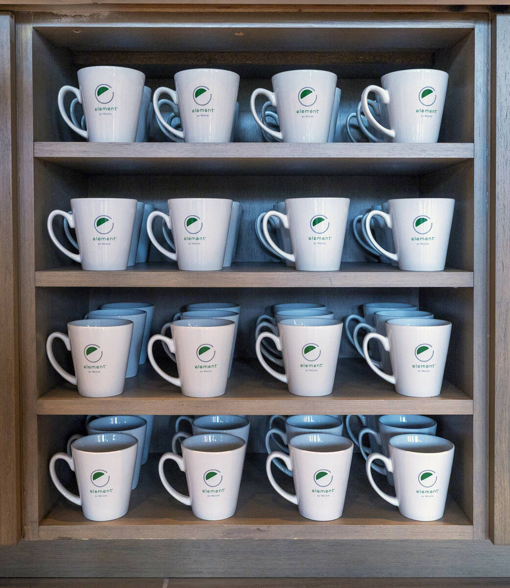 Coffee cups are stacked and ready in the dining area of the Element within the new AC / Element ...
