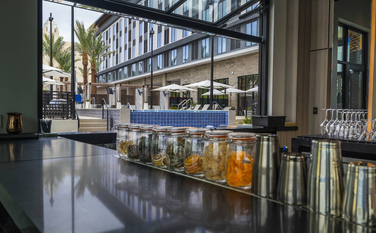 The windows to the pool deck can open up connected to the Element bar within the new AC / Eleme ...