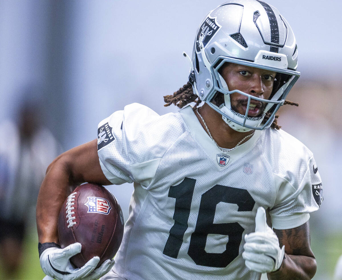 Raiders receiver Jakobi Meyers (16) runs the ball on a punt return drill during practice at the ...