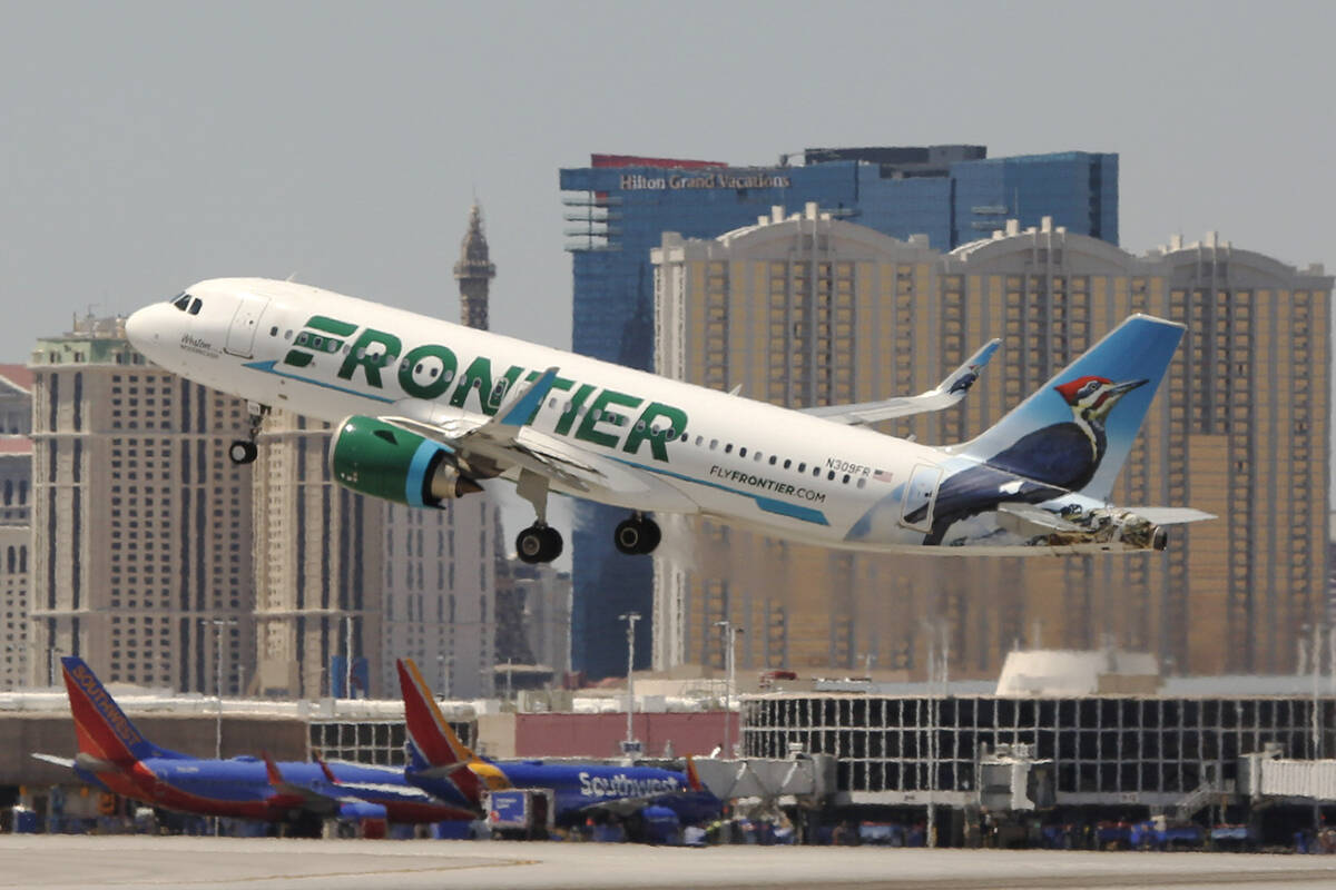 A Frontier airlines flight departs for takeoff at McCarran International Airport on Wednesday, ...