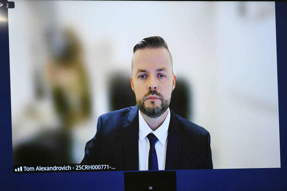 Israeli official Tom Artiom Alexandrovich appears remotely for a hearing on charges of trying t ...