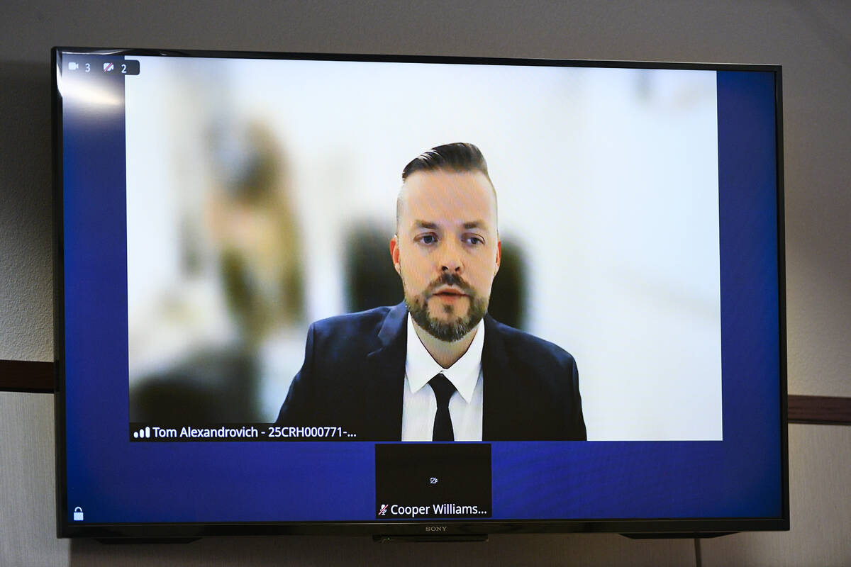 Israeli official Tom Artiom Alexandrovich appears remotely for a hearing on charges of trying t ...