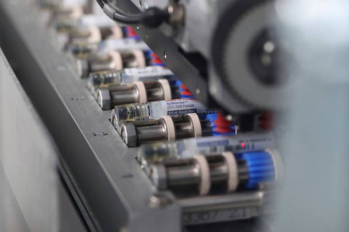 This photo provided by Moderna in August 2025 shows fill and finish production of the updated m ...