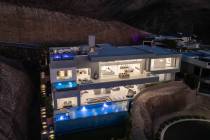 The mansion boasts three infinity-edge pools strategically positioned on separate floors. (Doug ...