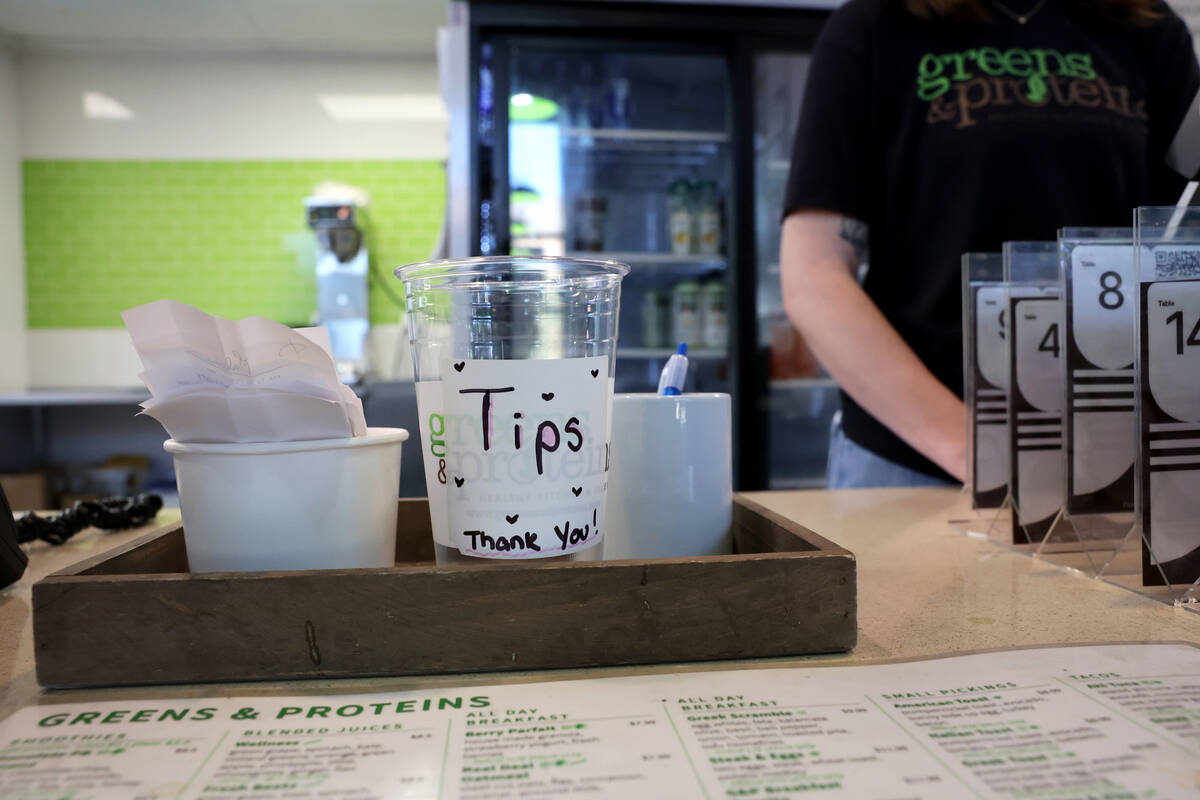 A tip jar is seen at Greens and Proteins restaurant in downtown Las Vegas in May. (K.M. Cannon/ ...