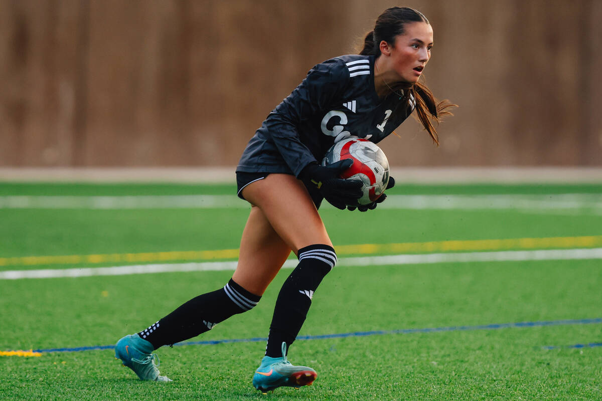 Bishop Gorman goalkeeper Lyvea Caceres makes a save during a girls soccer game between Coronado ...