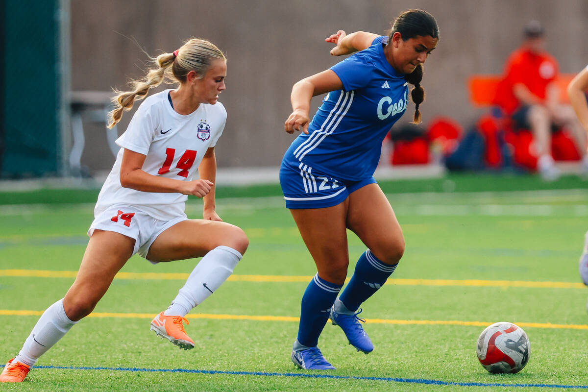 Bishop Gorman defender Laila Lazzara (21) commands the ball during a girls soccer game between ...