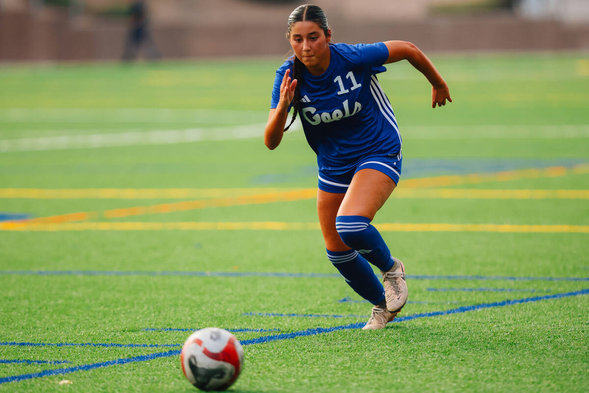 Bishop Gorman midfielder Devyn Giraldo (11) chases the ball during a girls soccer game between ...
