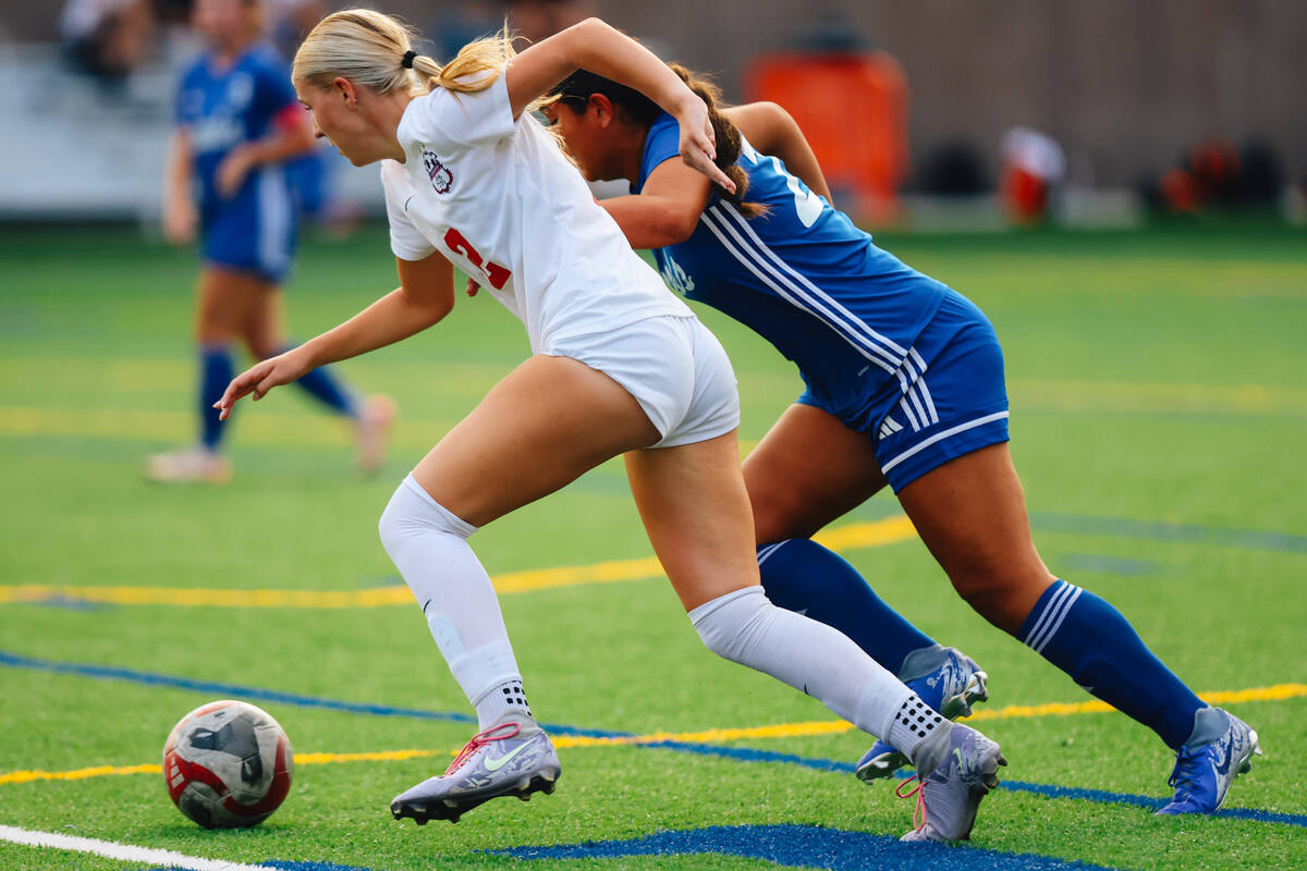 Coronado midfielder Emily McKinney chases the ball during a girls soccer game between Coronado ...