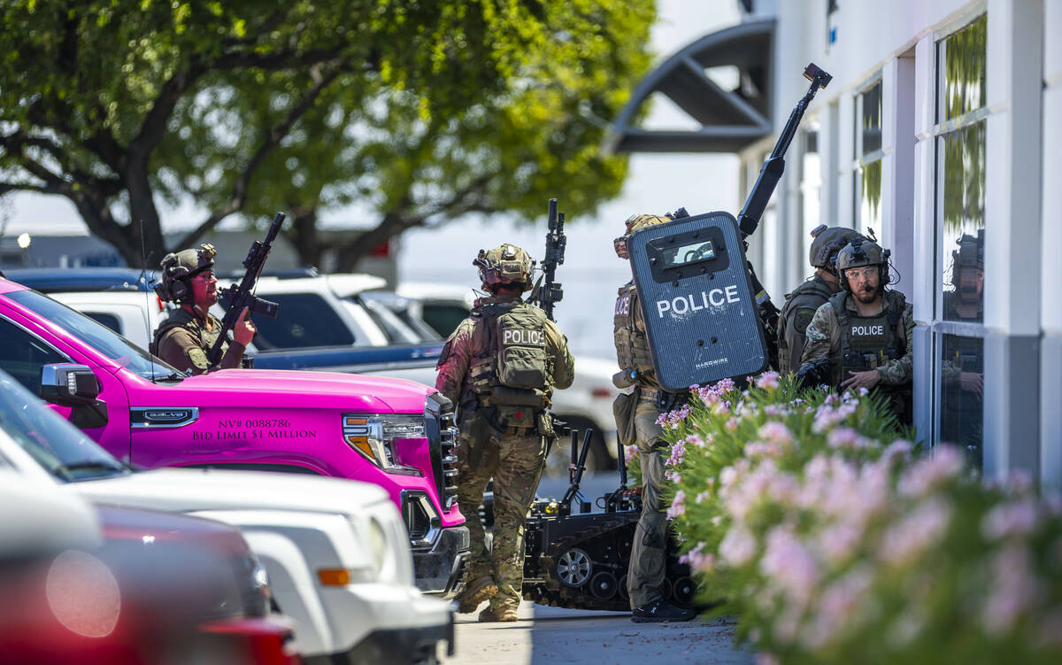 SWAT officers enter Glass Vegas as they join North Las Vegas Police with their Public Safety Un ...