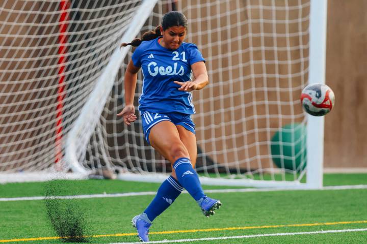 Bishop Gorman defender Laila Lazzara kicks the ball during a girls soccer game between Coronado ...