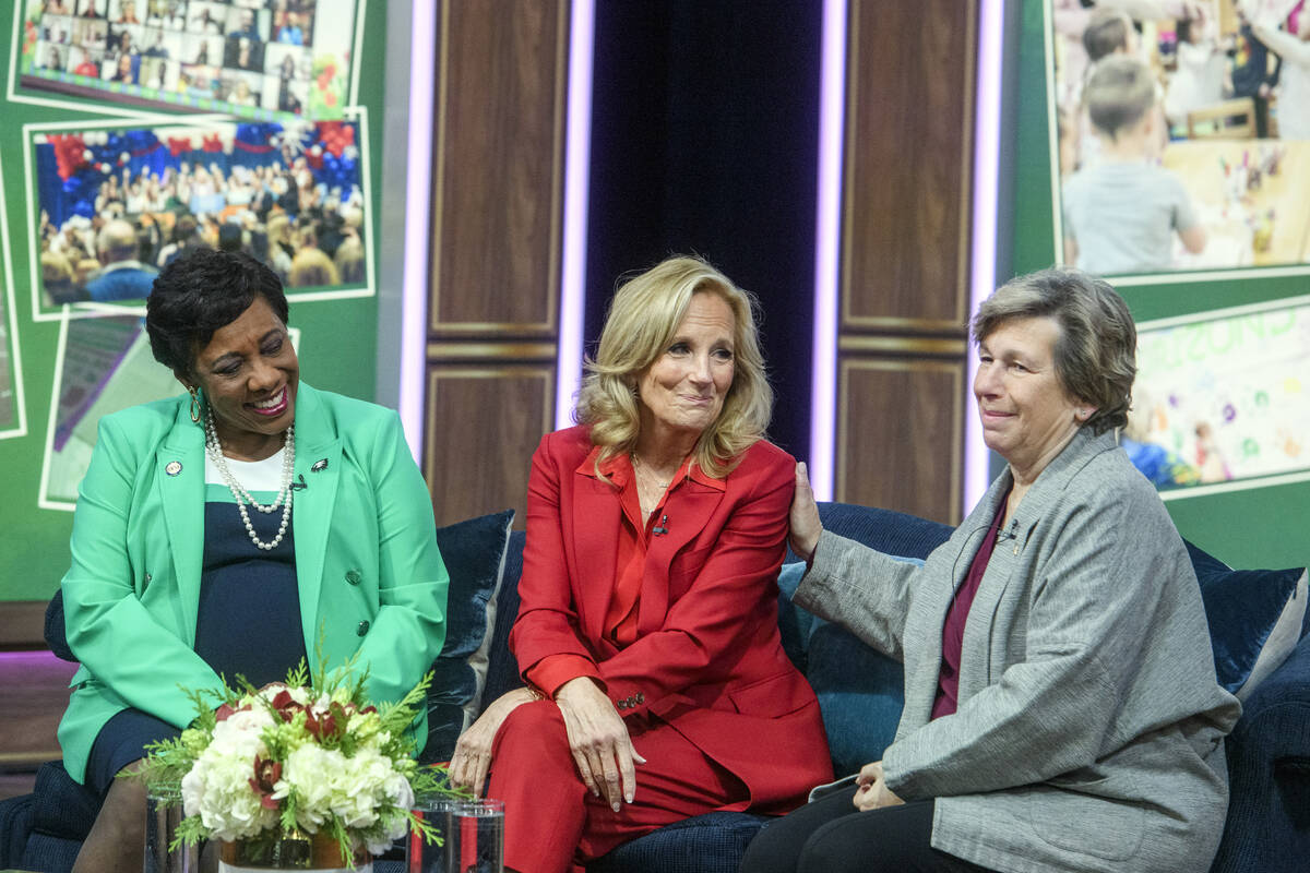 First lady Jill Biden, center, is joined by Becky Pringle, president of National Education Asso ...