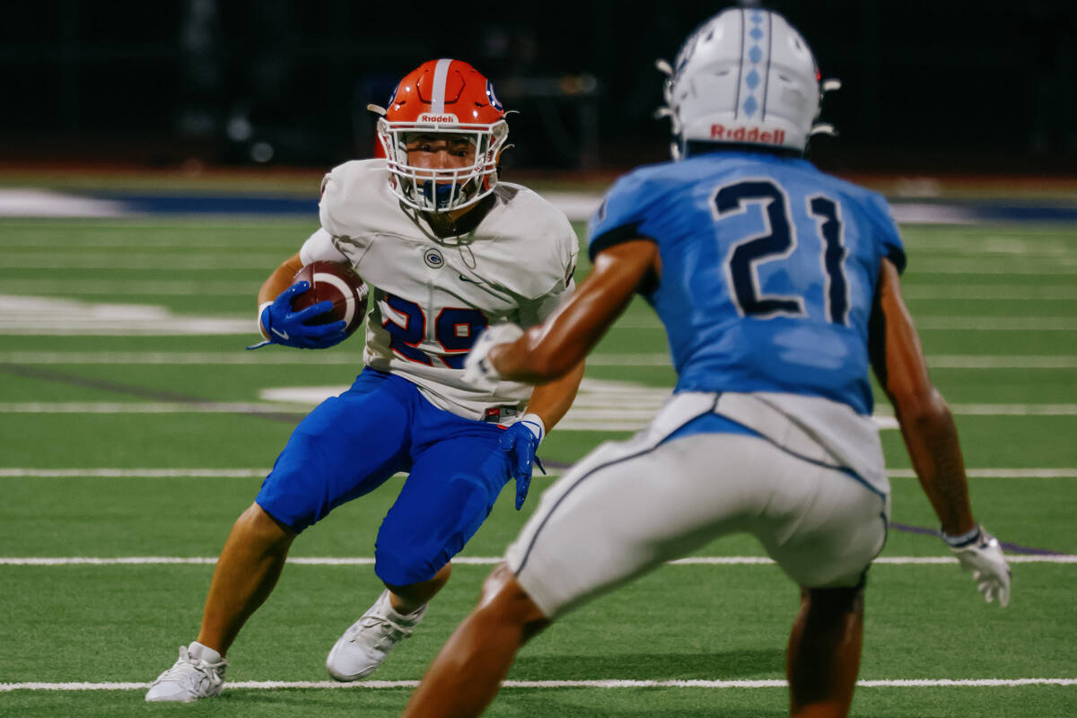 Bishop Gorman running back Ilijah Narciso (29) tries to dodge Centennial’s Dominique Vau ...