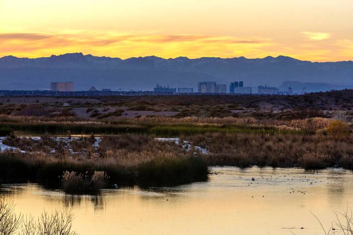The sun sets as water flows along the Las Vegas Wash in 2024. (L.E. Baskow/Las Vegas Review-Jou ...