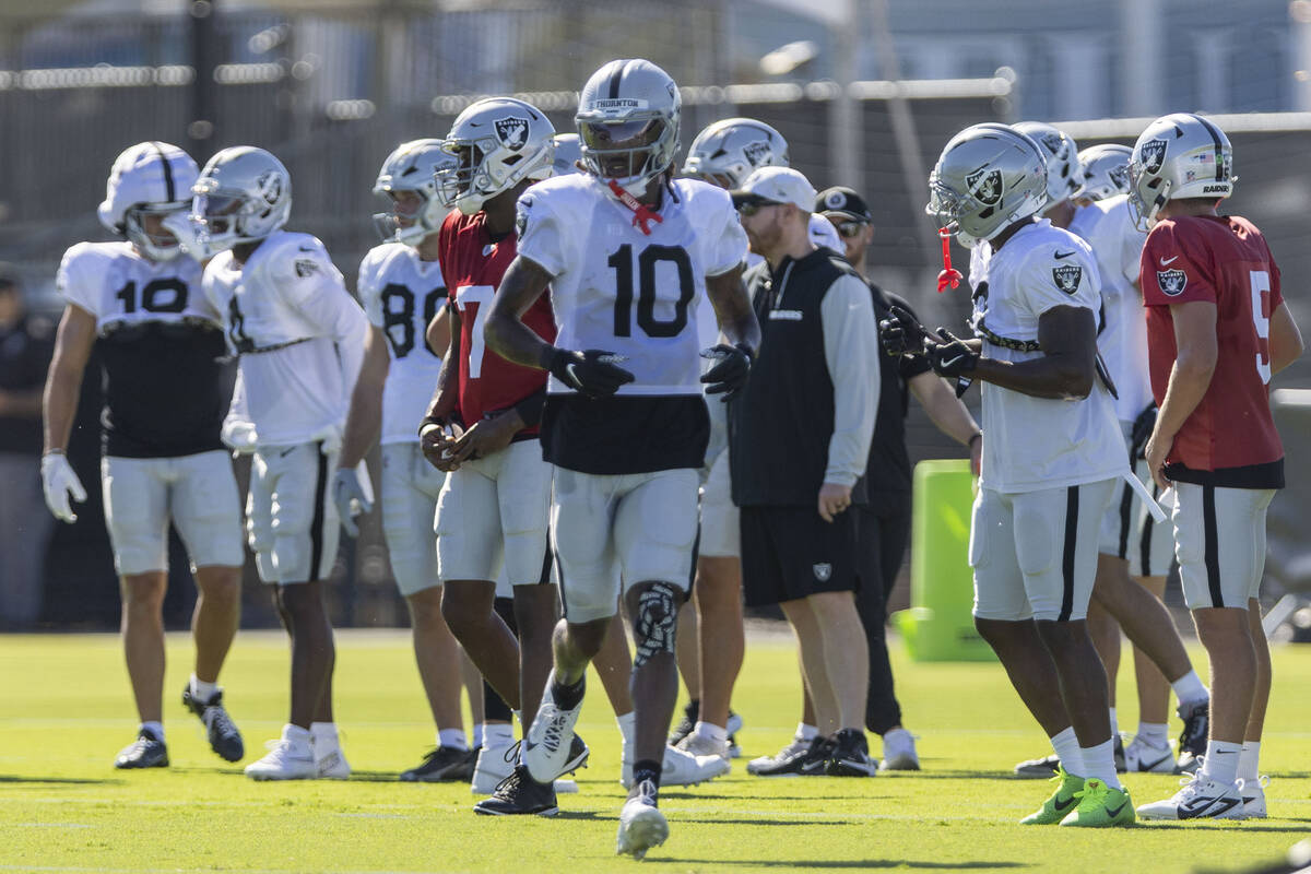 Raiders wide receiver Dont'e Thornton Jr. (10) runs to line up for a drill during the team ...