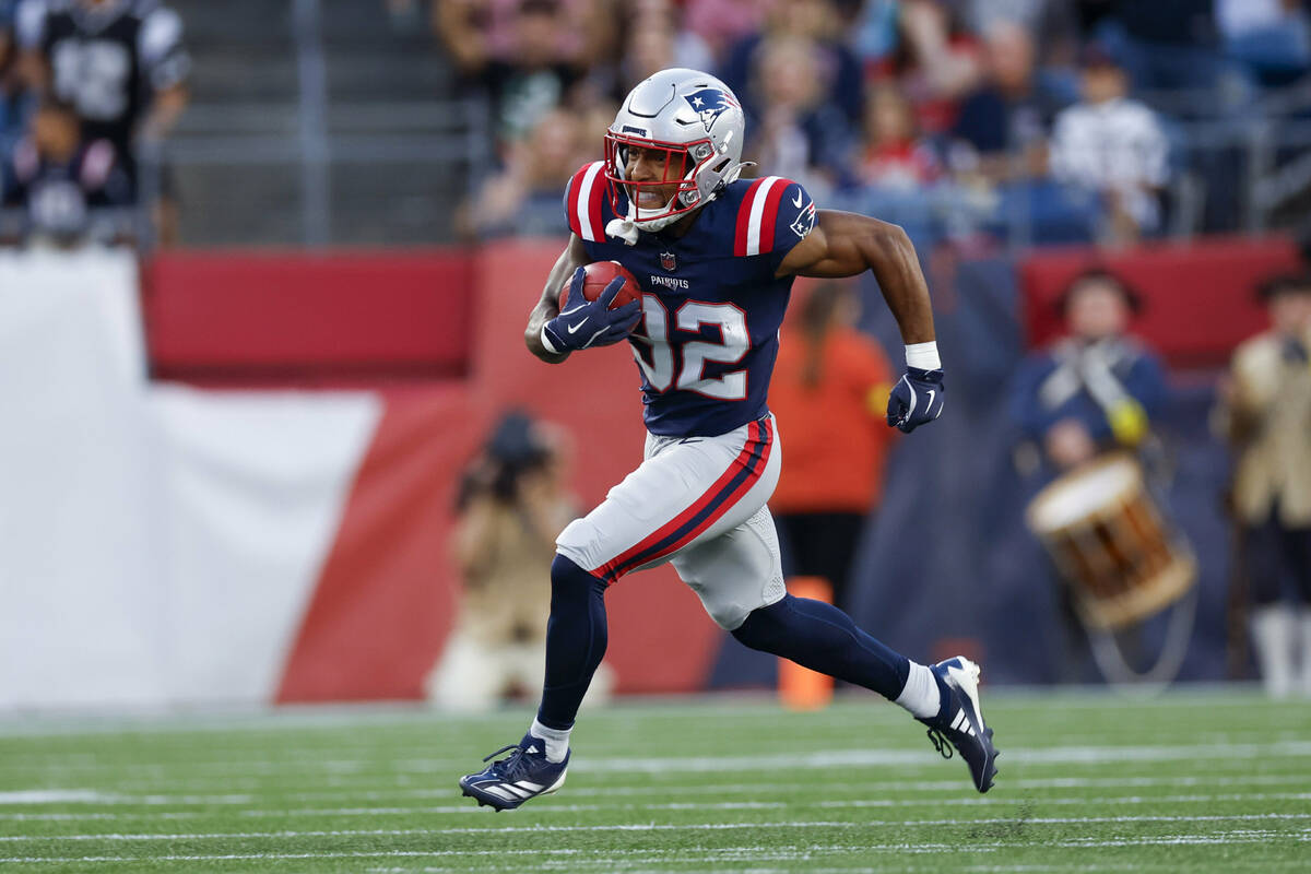 New England Patriots TreVeyon Henderson (32) carries the ball for a run back touchdown during t ...