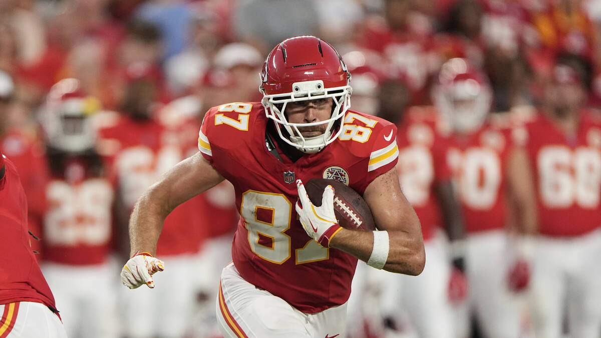 Kansas City Chiefs tight end Travis Kelce runs the ball during the first half of an NFL preseas ...