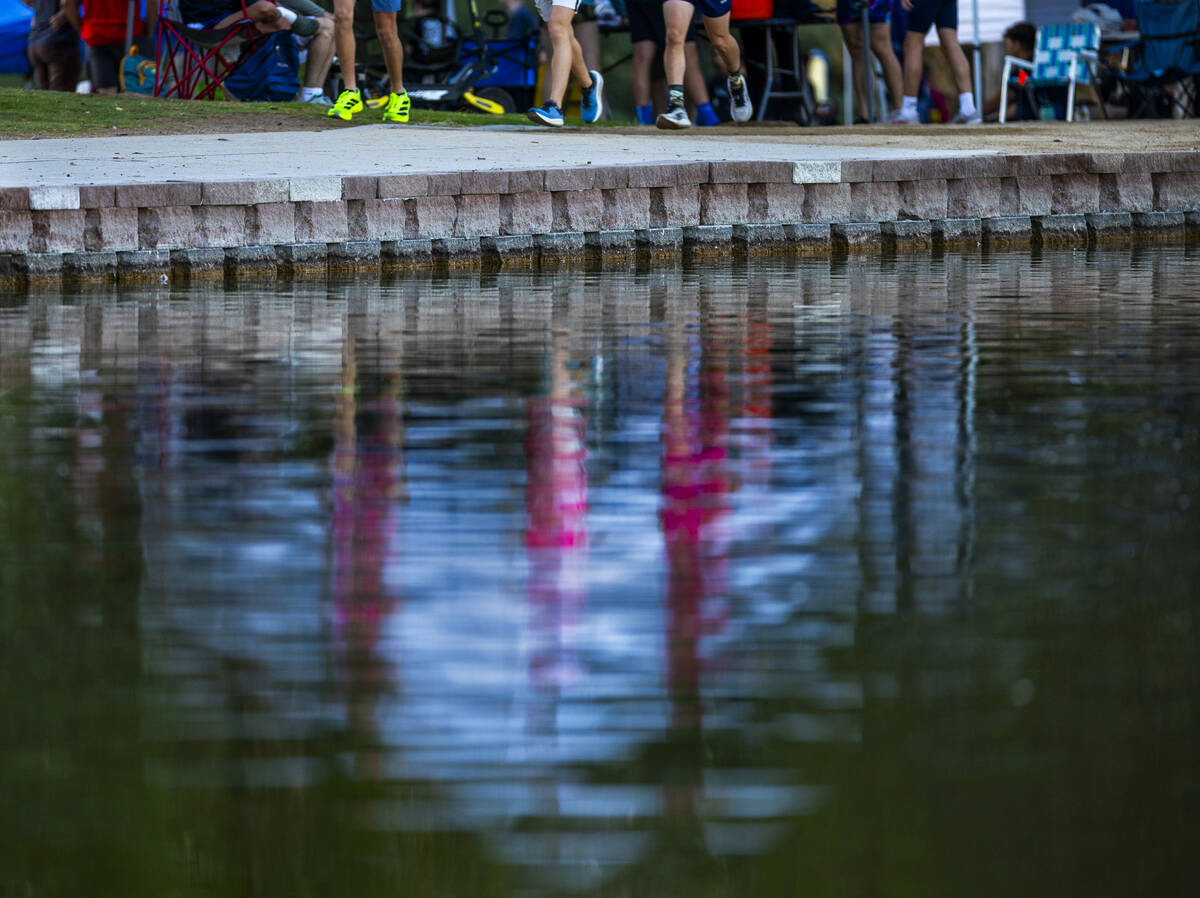 Varsity A Boys competitors warm up around the lake during the 55th Annual Las Vegas/Larry Burge ...