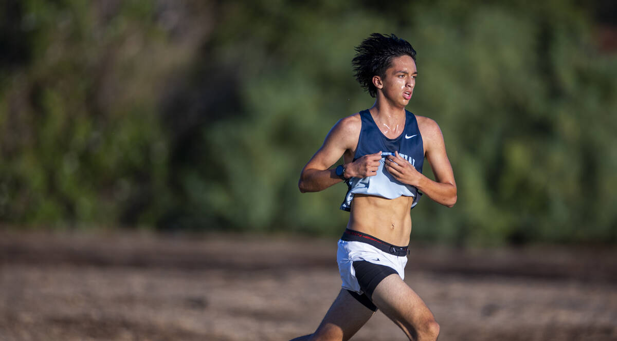 Centennial high school runner Calvin Rivera (611) holds the third position in the Varsity A Boy ...