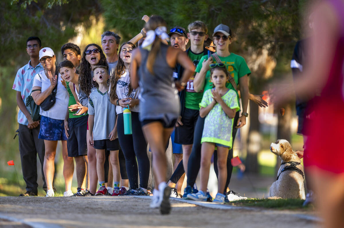 The crowd cheers for racers as the Variety A Girls navigate around the lake during the 55th Ann ...