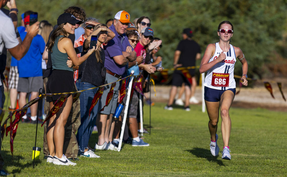 Coronado High School runner Brooke-Lynn Miller (686) nears the finish line to take second place ...