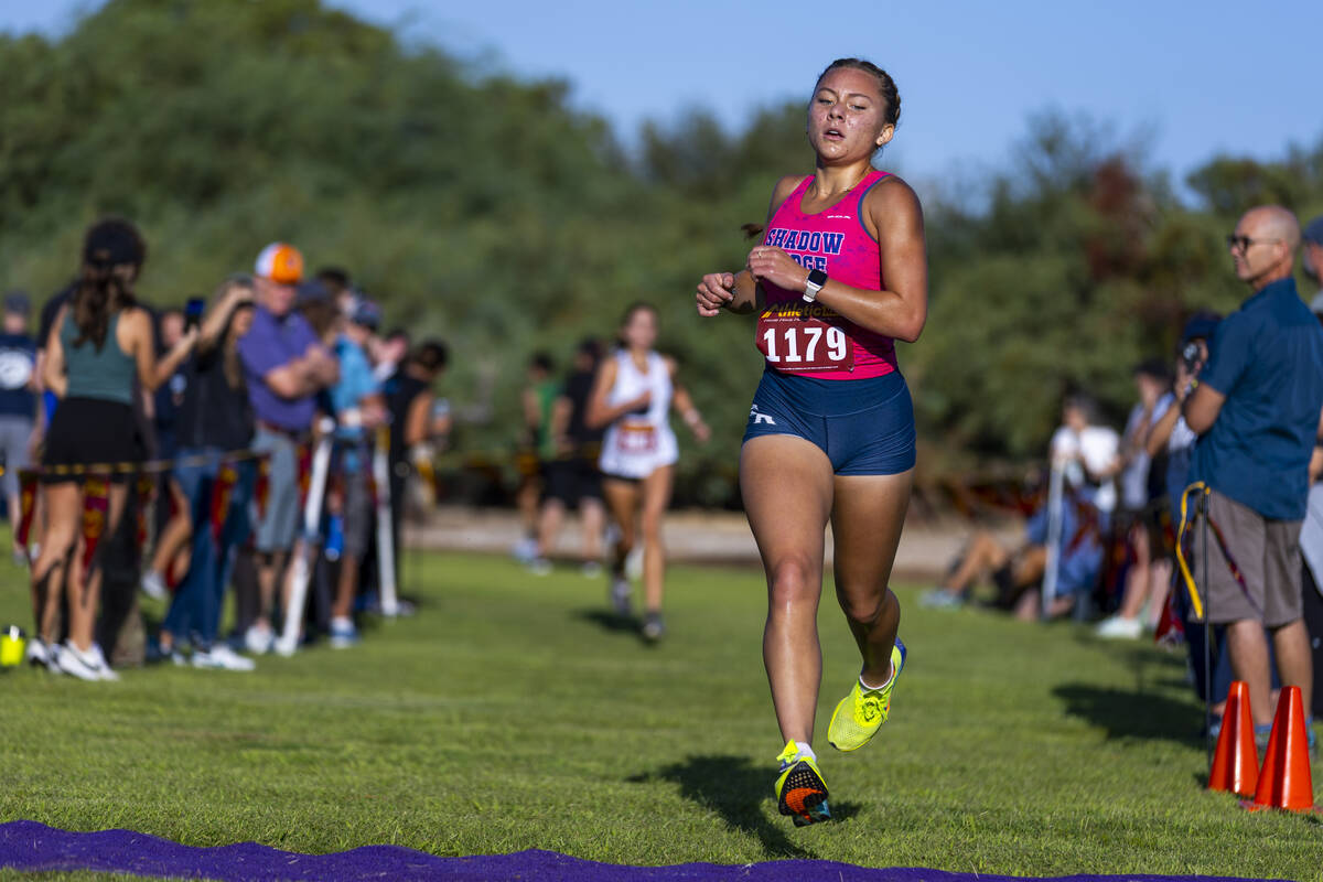 Shadow Ridge High School runner Elynn Okuda (1179) makes the finish line to take third place du ...