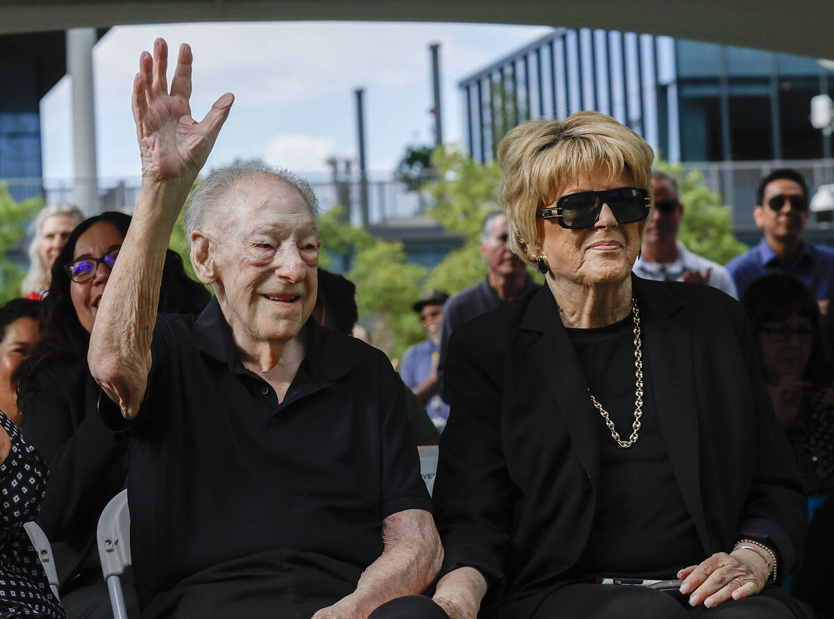 Former Las Vegas Mayors Oscar and Carolyn Goodman are acknowledged before the start of a ribbon ...