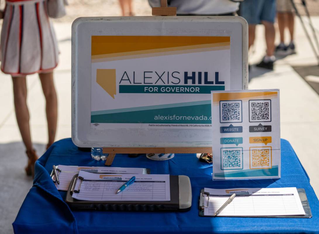 A sign-in table is seen as Alexis Hill speaks to the media during a campaign kickoff press conf ...