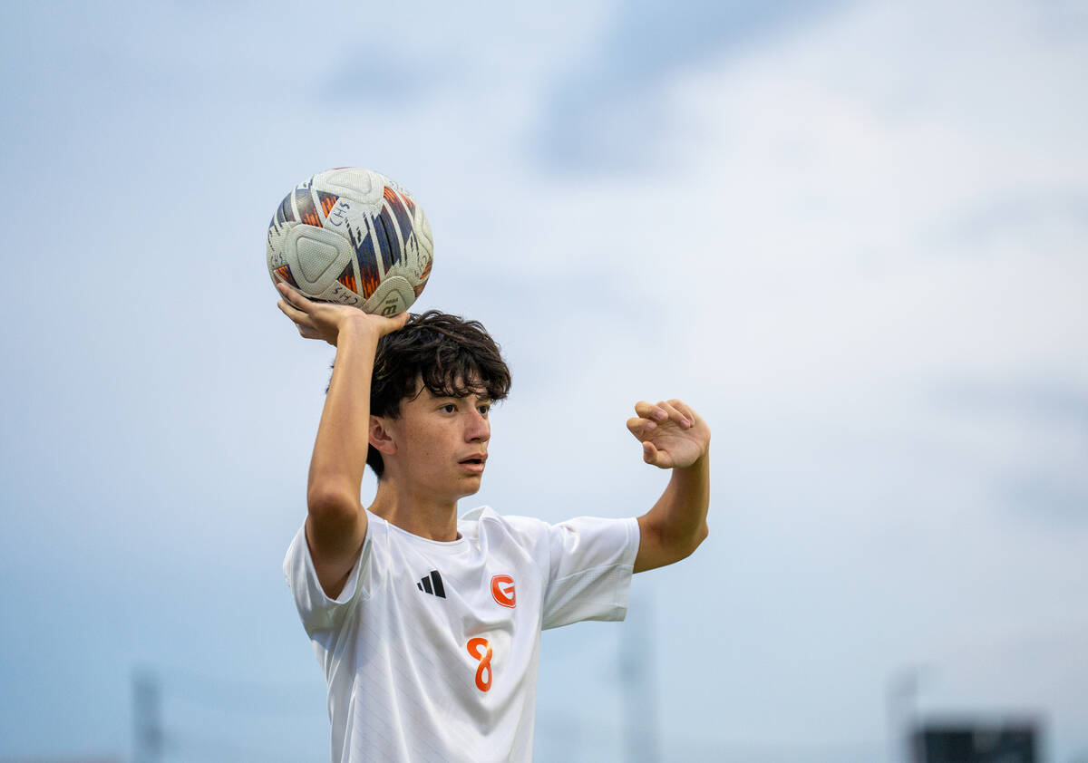 Bishop Gorman midfielder Reydante Rubalcava (8) looks to make a throw-in during a soccer match ...