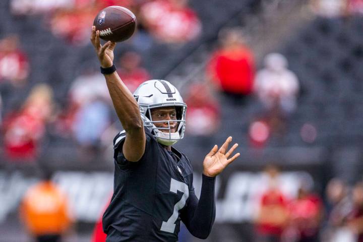 Raiders quarterback Geno Smith (7) gets off a pass during warm ups of their pre-season NFL game ...