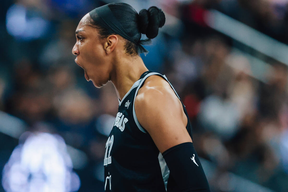 Aces center A'ja Wilson celebrates a 3-point shot during a WNBA basketball game between the Ace ...
